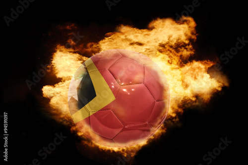 football ball with the flag of east timor on fire