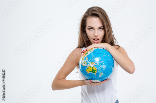 Beautiful woman holding globe