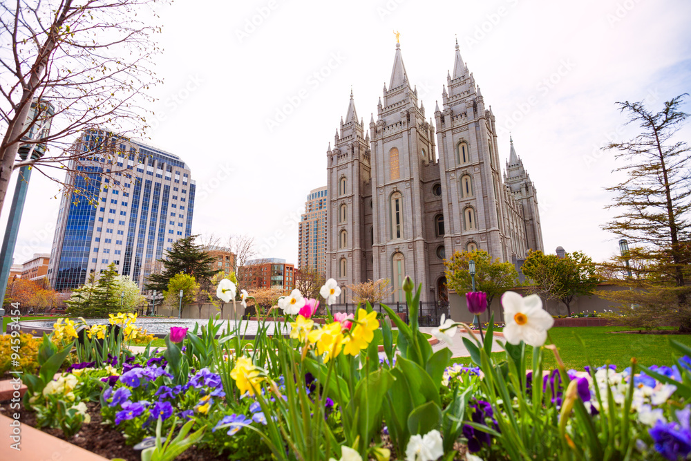 Salt Lake Temple with beautiful flowers during day