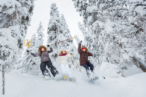 Obraz na płótnie Young adults snowshoeing