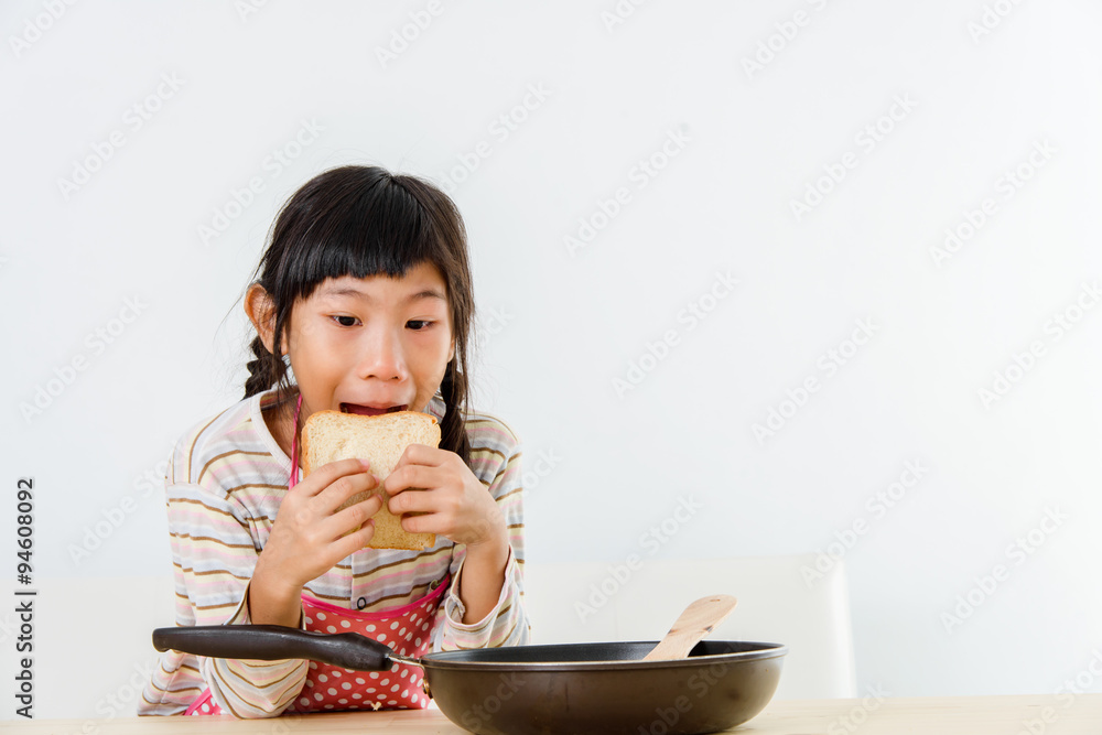 Asian girl cooking at home. Lifestyle concept. Asian girl cooking at home. Lifestyle concept.