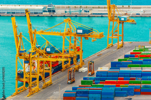 Loading containers on a sea cargo ship, Barcelona