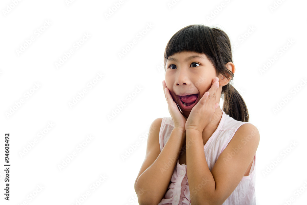 Cute little girl in pink making funny face Cute little girl in pink making funny face