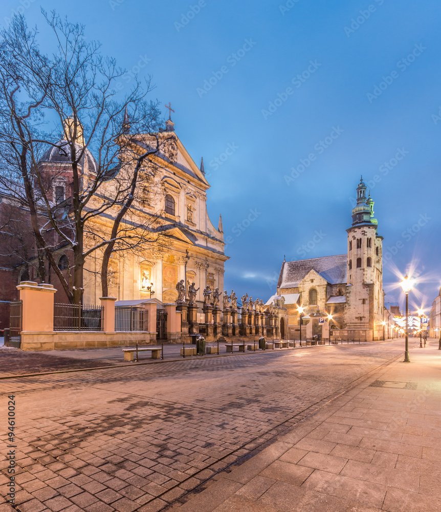 Fototapeta premium Krakow, Poland, baroque church of st Peter and Paul with St Andrew church in blue hour, winter morning.