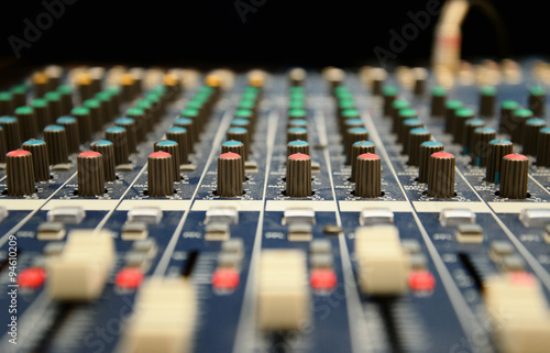 Close up of professional mixing console for music