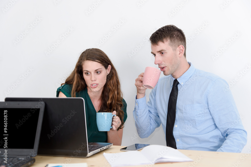 Business people Having Meeting Around Table In Office Business people Having Meeting Around Table In Office