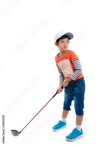 Little boy taking golf club