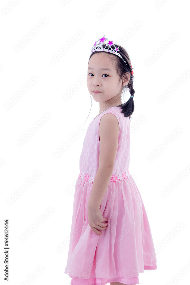 Cute Asian little princess girl in silver crown and pink dress o Cute Asian little princess girl in silver crown and pink dress o