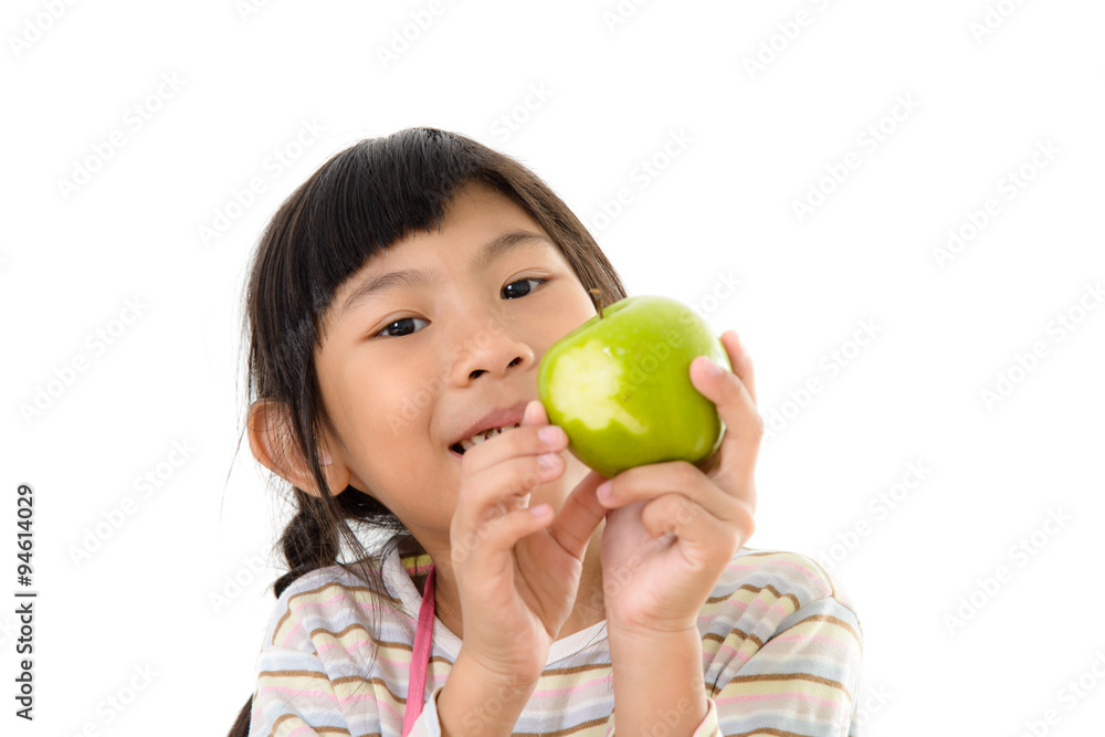 Happy Asian girl eating green apple, isolated on white. Happy Asian girl eating green apple, isolated on white.