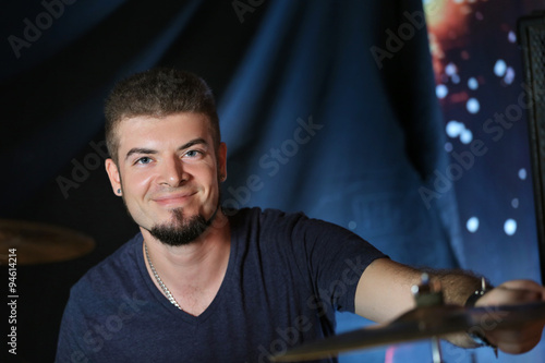 Drummer on dark background