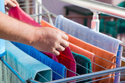 Принти на полотні Towels hanged on clothes dryer