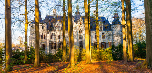 castle in autumn forest - castles of Belgium. Borrekens photo