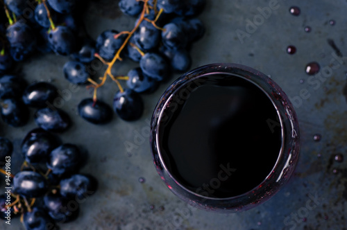 Fotografie Red wine in a wineglass top view