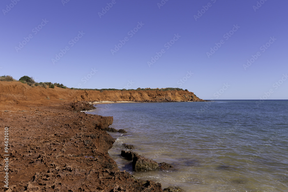 Red Flat Rocks by the Beach at Peron Point in Francois Peron National Park Shark Bay