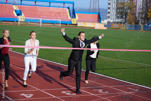 business people running on racing track © .shock