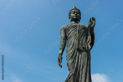 Standing Buddha statue and sky backgroud in Thailand © ballball14