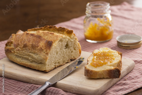 Orange jam and bread for breakfast