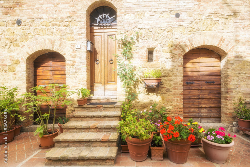 street of medieval Pienza town in Tuscany. Italy - obrazy, fototapety, plakaty 