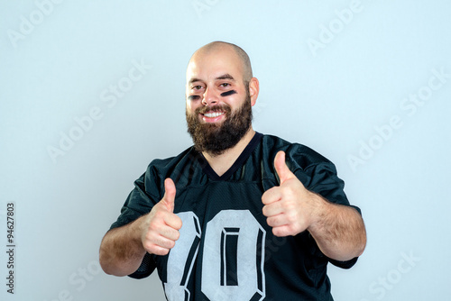 american football player with thumbs up