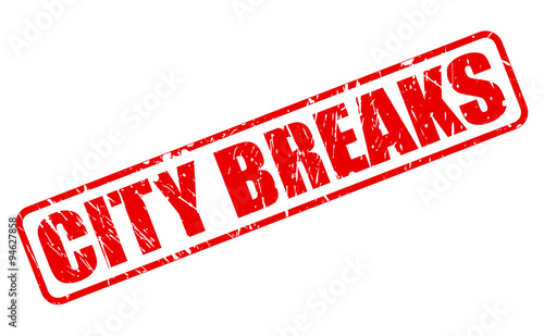 CITY BREAKS red stamp text