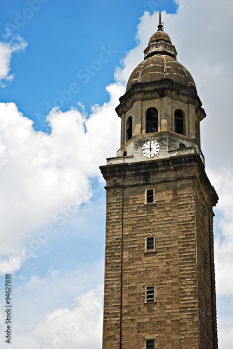 Old Bell Tower or Belfry on a Blue Sky