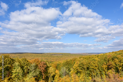 Rural landscape in the autumn with blue sky