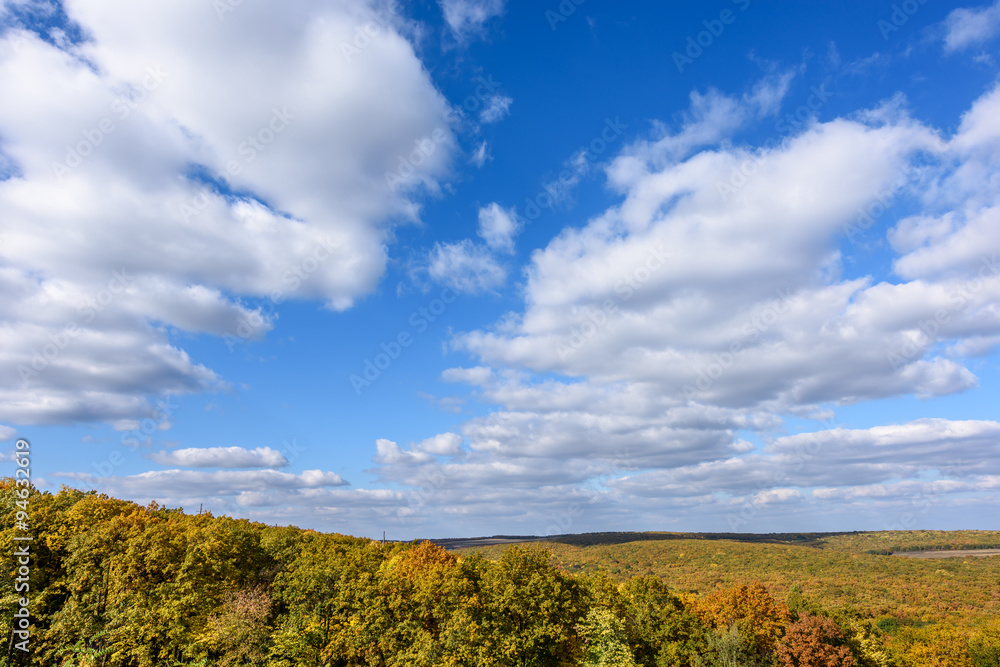 Rural landscape in the autumn with blue sky