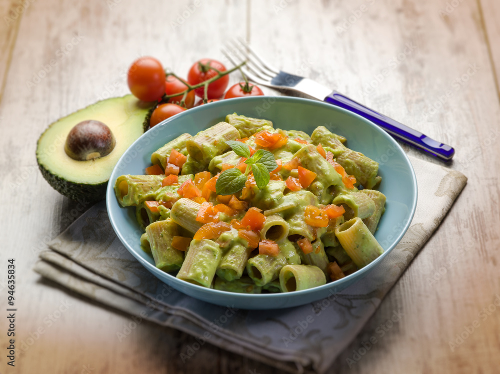 pasta with avocado and tomatoes, selective focus pasta with avocado and tomatoes, selective focus