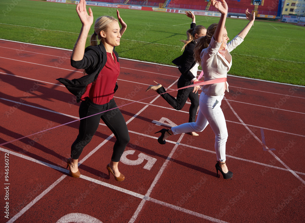 business people running on racing track