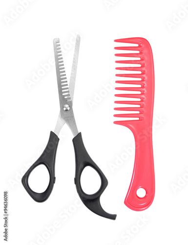 hairdressing scissors and comb isolated on white