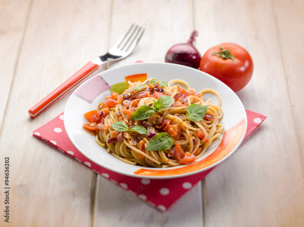 spaghetti with fresh tomato red onion and hot chili pepper, selective focus spaghetti with fresh tomato red onion and hot chili pepper, selective focus