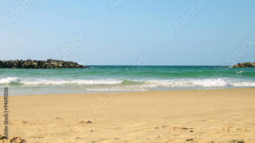 Sea beach in sunny day, slow motion photo