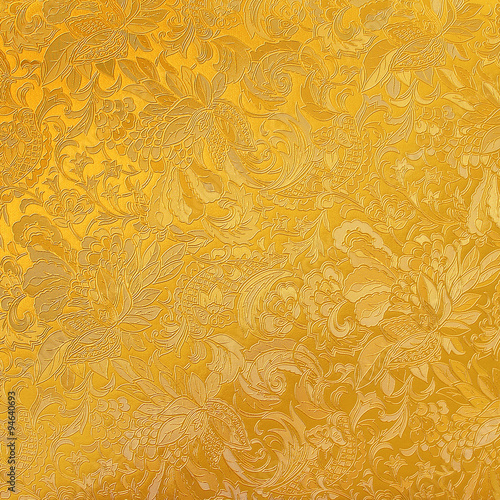 Golden floral ornament brocade textile pattern photo