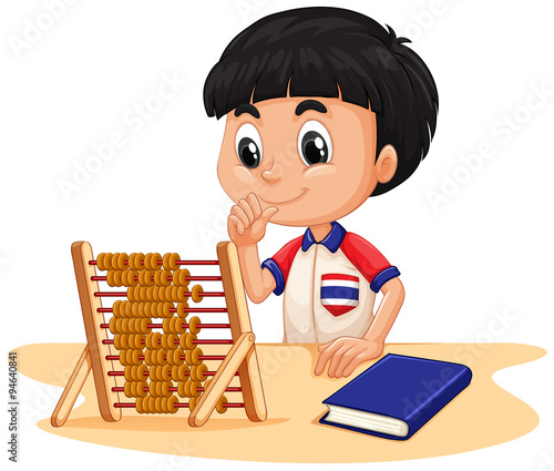Boy calculating with abacus