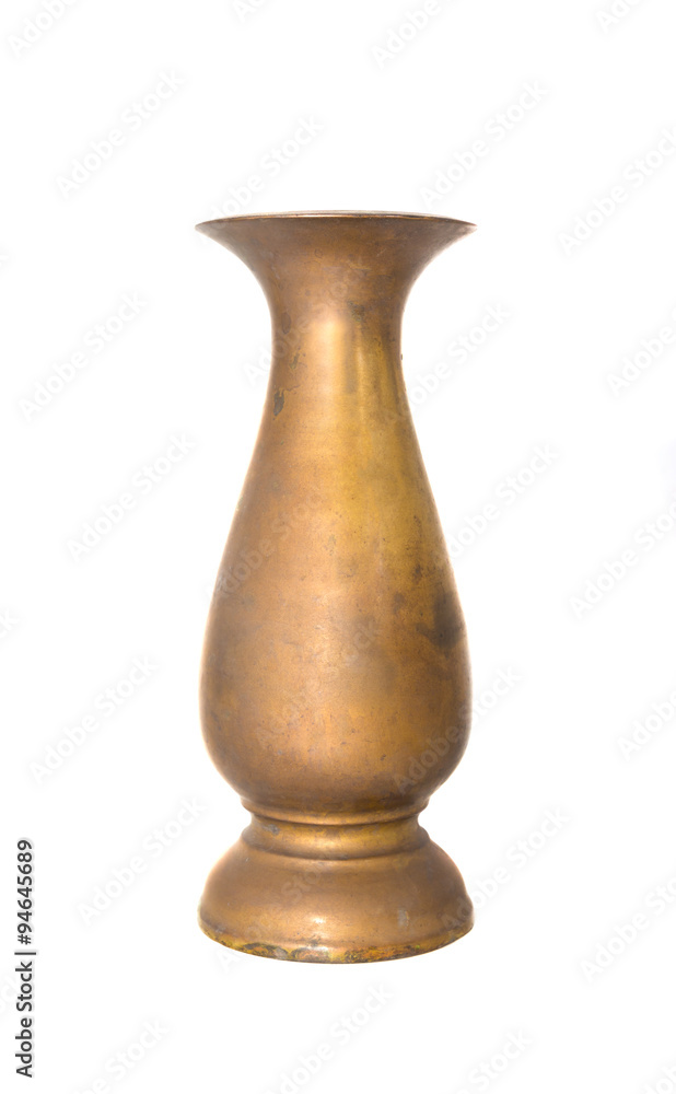 old brass vase on background