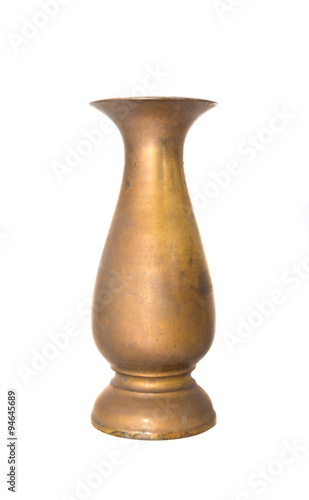 old brass vase on background