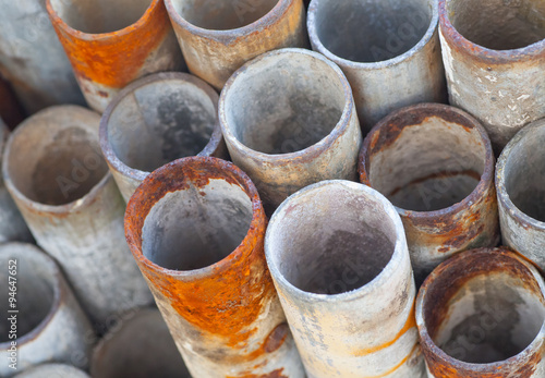 Close - up Stack of construction metal pipes.. © torsakarin