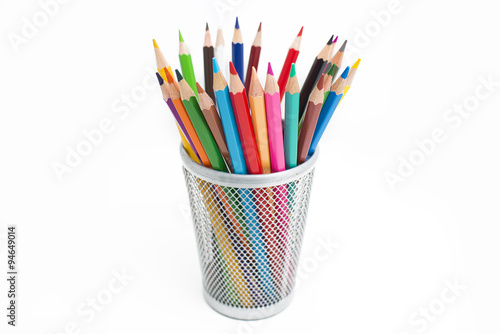 Colored pencils in a pencil case on white background