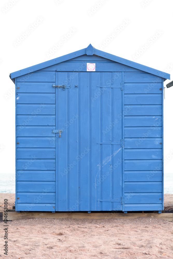 A blue wooden beach hut in Teignmouth, Devon, England A blue wooden beach hut in Teignmouth, Devon, England