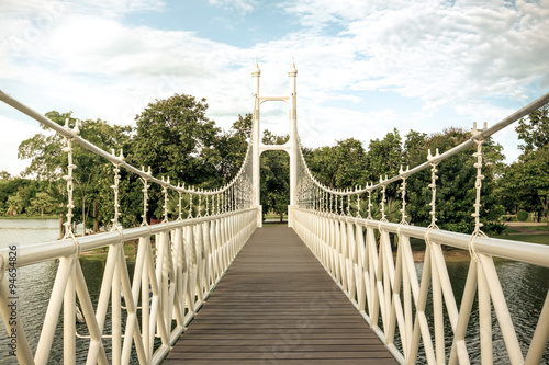 White bridge in city park at Bung Ta Lua Water Park Nakhon Ratch