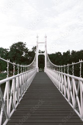 White bridge in city park at Bung Ta Lua Water Park Nakhon Ratch