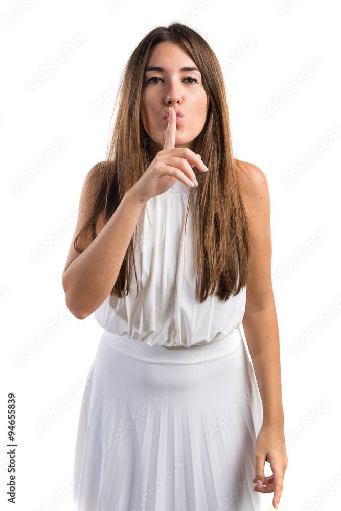 Girl making silence gesture