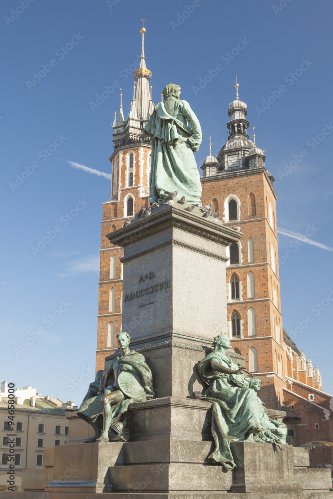 Fototapeta premium Poland, Krakow, Mickiewicz Monument, st Mary Curch Towers, Midday