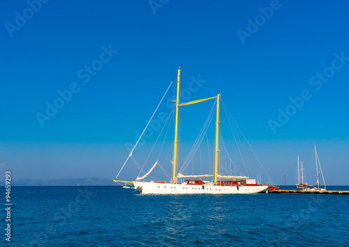 beautiful big old sailing boat docked at the port of Kos island in Greece