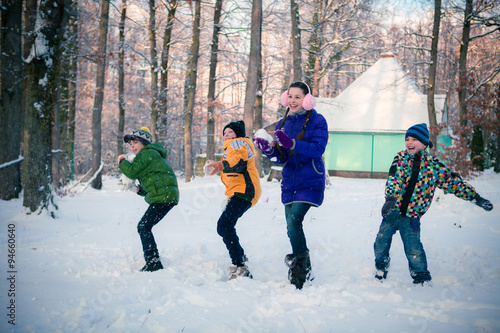 children playing snowballs
