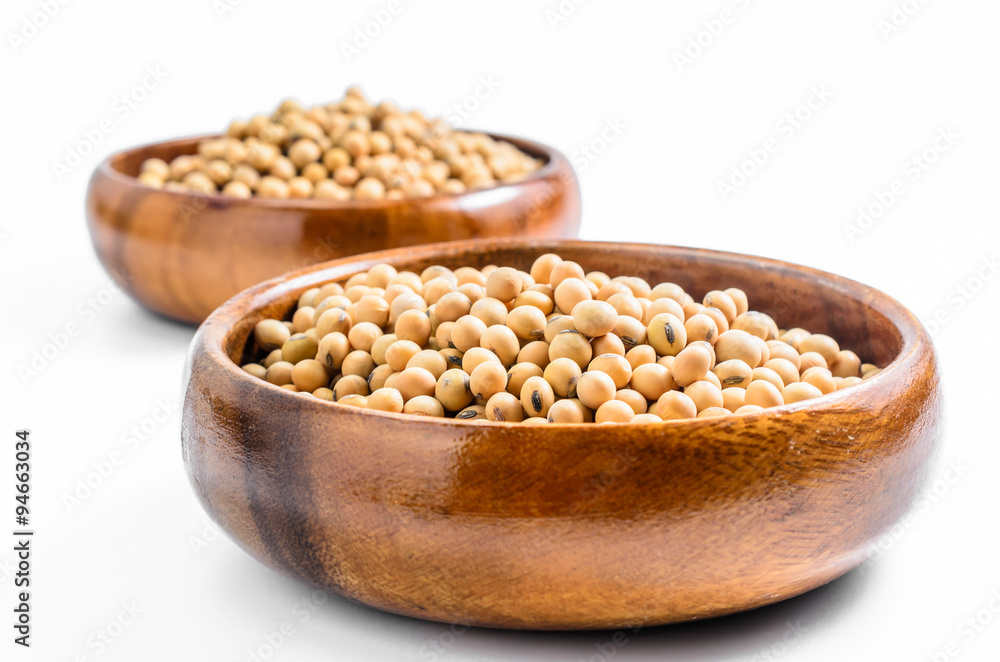 soybeans in wooden bowl isolated on white background.. soybeans in wooden bowl isolated on white background..