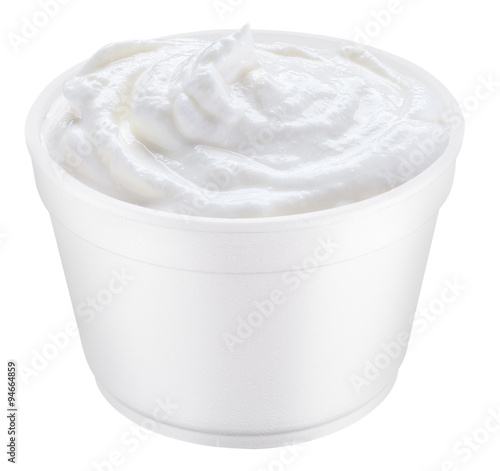 Sour cream in the polystyrene cup.