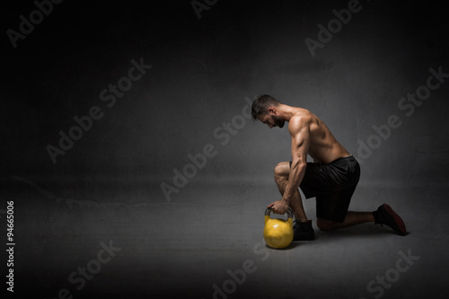 man ready to lifting a kettleball