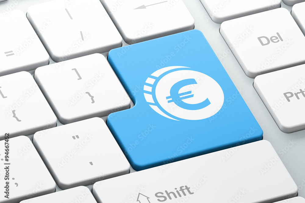 Currency concept: Euro Coin on computer keyboard background Currency concept: Euro Coin on computer keyboard background