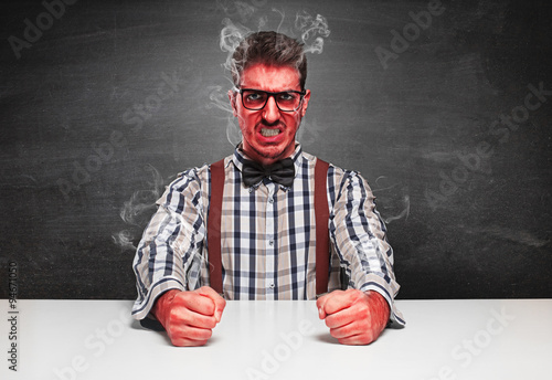 Fototapeta Angry genius furious on blackboard background